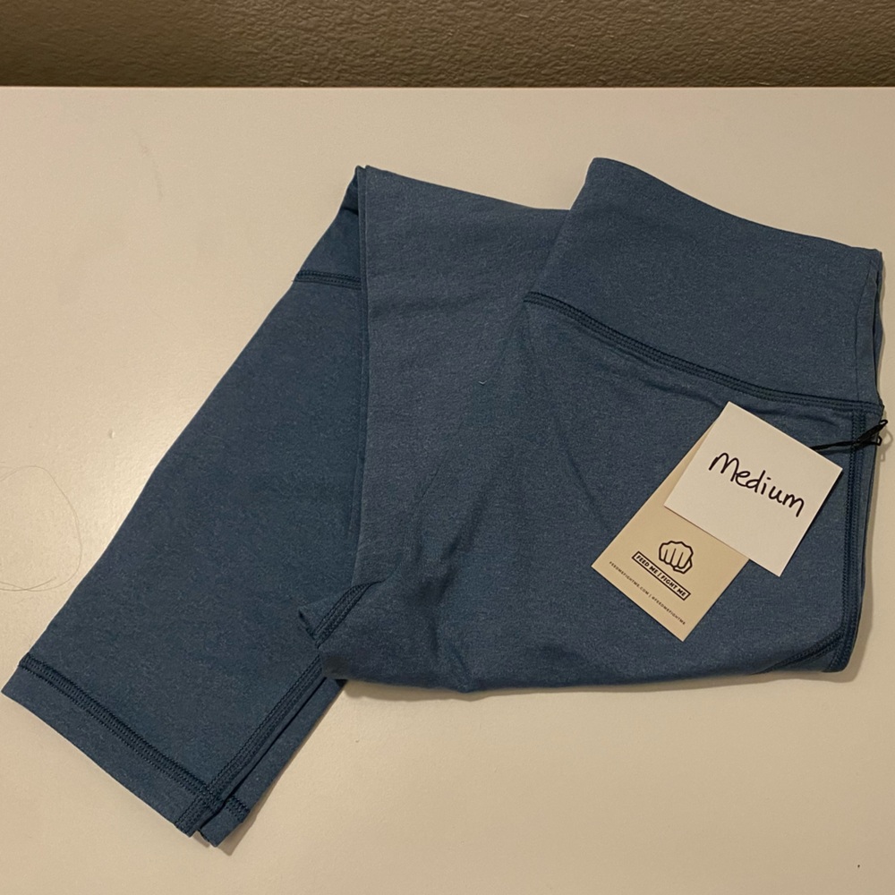 Feed Me Fight Me leggings - Med - NWT